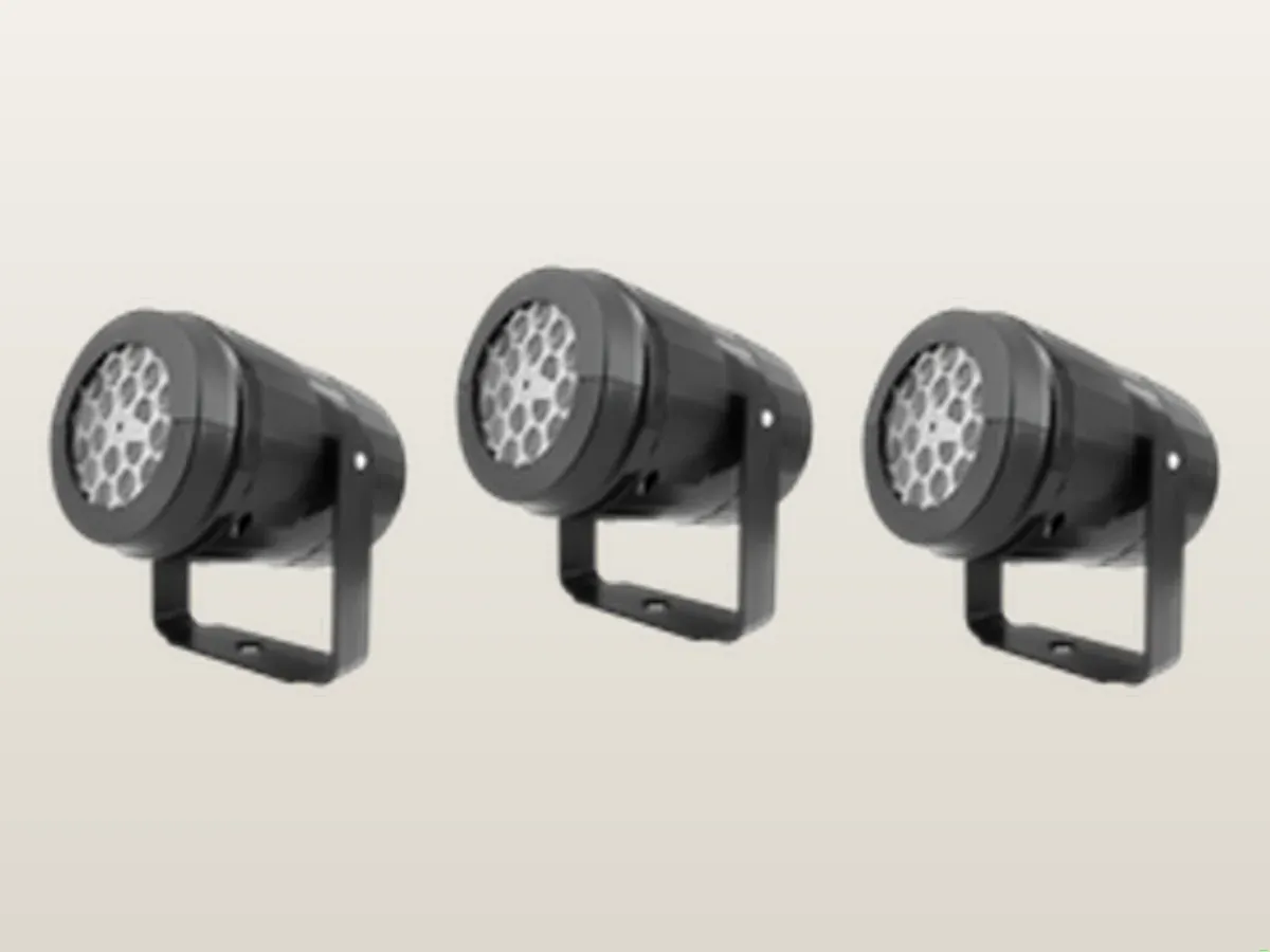 Three Holiday Prism LED projector units with swivel brackets